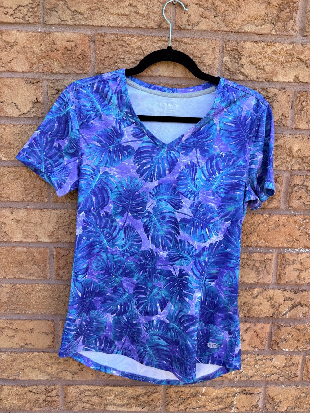 4/$25 • Reel Legends Freeline Purple Tropical Leaf V-Neck Women's Top